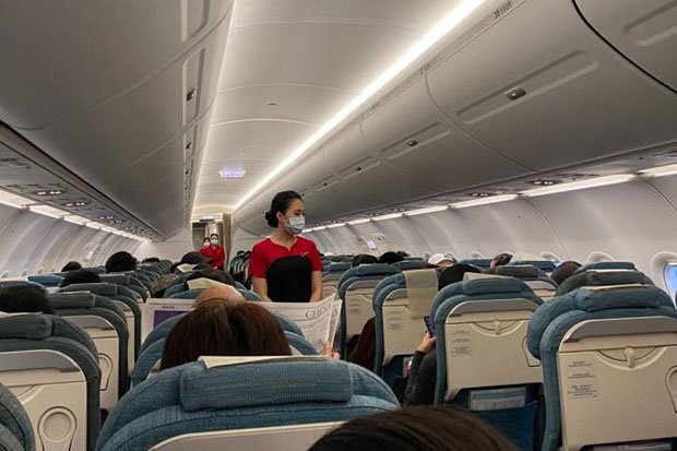 Cathay Pacific lets staff wear surgical masks on flights