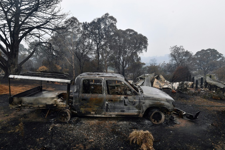 Australian bushfires flare again, water-bombing plane missing