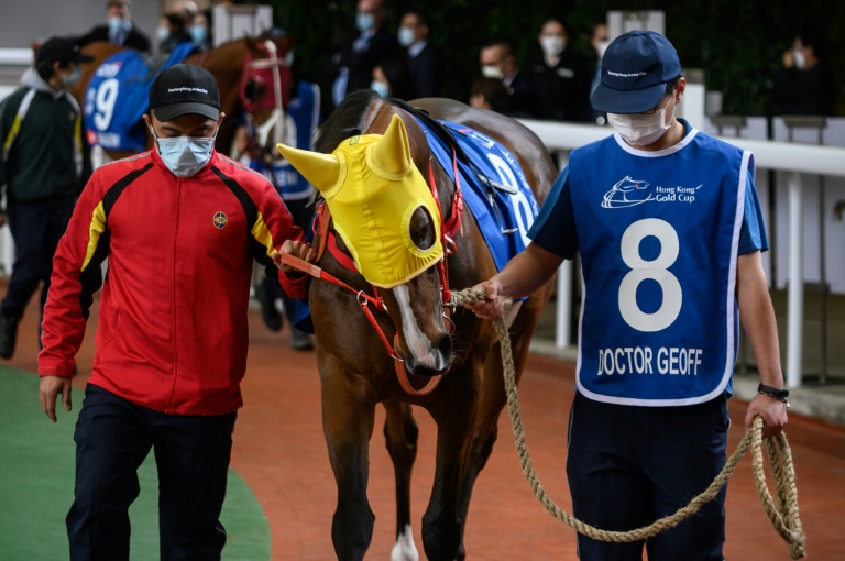 It was a surreal meeting at Sha Tin in front of just 307 spectators, made up entirely of owners and guests, with only the horses not wearing masks It was a surreal meeting at Sha Tin in front of just 307 spectators, made up entirely of owners and guests, with only the horses not wearing masks