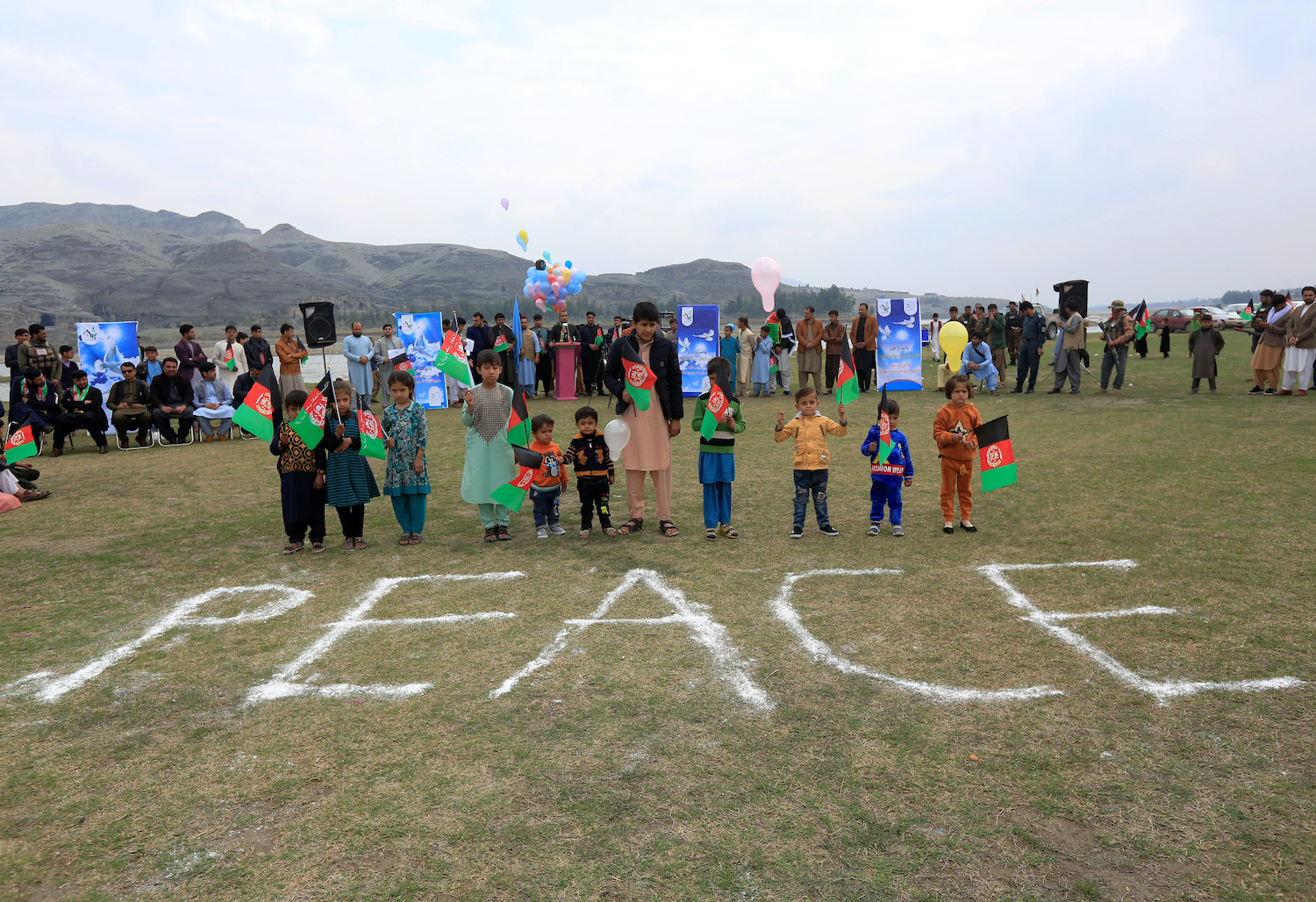 Afghan children celebrate the US-Taliban agreement that is intended to pave the way for a US troop reduction and a permanent ceasefire, in Jalalabad on Friday. (Reuters Photo) Afghan children celebrate the US-Taliban agreement that is intended to pave the way for a US troop reduction and a permanent ceasefire, in Jalalabad on Friday. (Reuters Photo)
