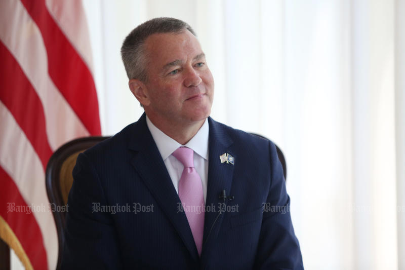 US ambassador to Thailand Michael DeSombre reacts during an interview on Wednesday. (Photo by Varuth Hirunyatheb)