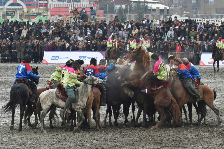 Horsemen compete during Afghanistan's first buzkashi league, in Kabul on March 12 Horsemen compete during Afghanistan's first buzkashi league, in Kabul on March 12
