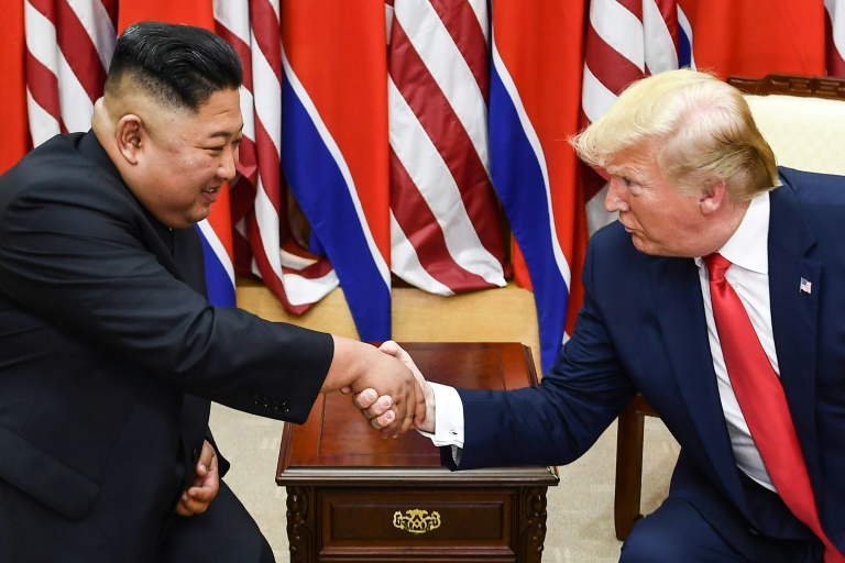 North Korean leader Kim Jong Un (L) and US President Donald Trump shake hands on June 30, 2019, during a meeting on the south side of the Military Demarcation Line that divides North and South Korea. North Korean leader Kim Jong Un (L) and US President Donald Trump shake hands on June 30, 2019, during a meeting on the south side of the Military Demarcation Line that divides North and South Korea.