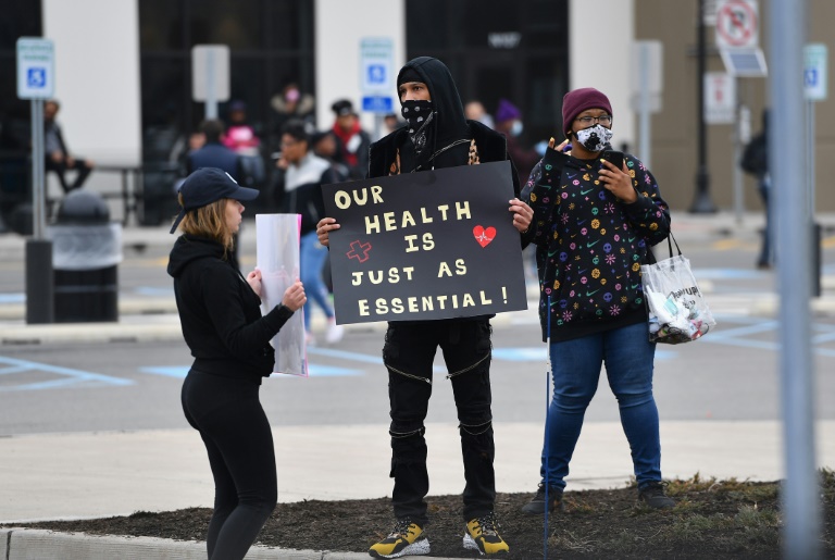 Amazon workers at Amazon's Staten Island warehouse stage a walkout to demand that the facility be shut down and cleaned after one staffer tested positive for the coronavirus Amazon workers at Amazon's Staten Island warehouse stage a walkout to demand that the facility be shut down and cleaned after one staffer tested positive for the coronavirus