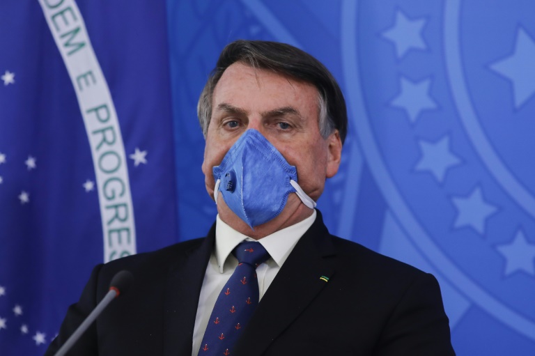 Brazilian president Jair Bolsonaro shared videos showing him flouting his government's social distancing guidelines Brazilian president Jair Bolsonaro shared videos showing him flouting his government's social distancing guidelines