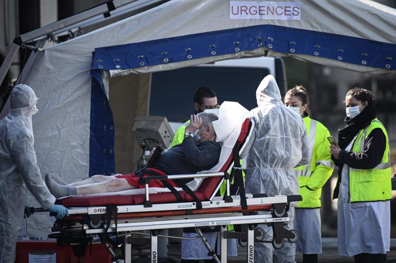 Spain’s fatalities climb, Putin remote meetings: Virus update