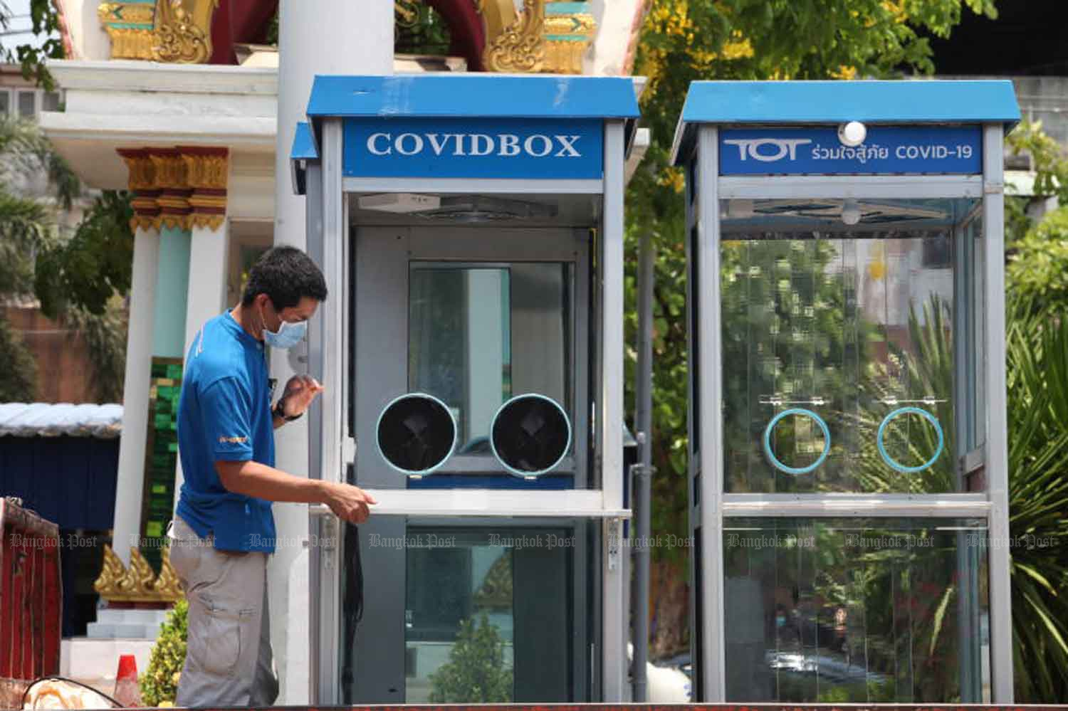 Unused phone booths have been converted into test cubicles for screening coronavirus infections. The booths were unloaded at the Covid-19 test station at Samut Sakhon Hospital in Muang district of Samut Sakhon province. (Photo by Apichart Jinakul)