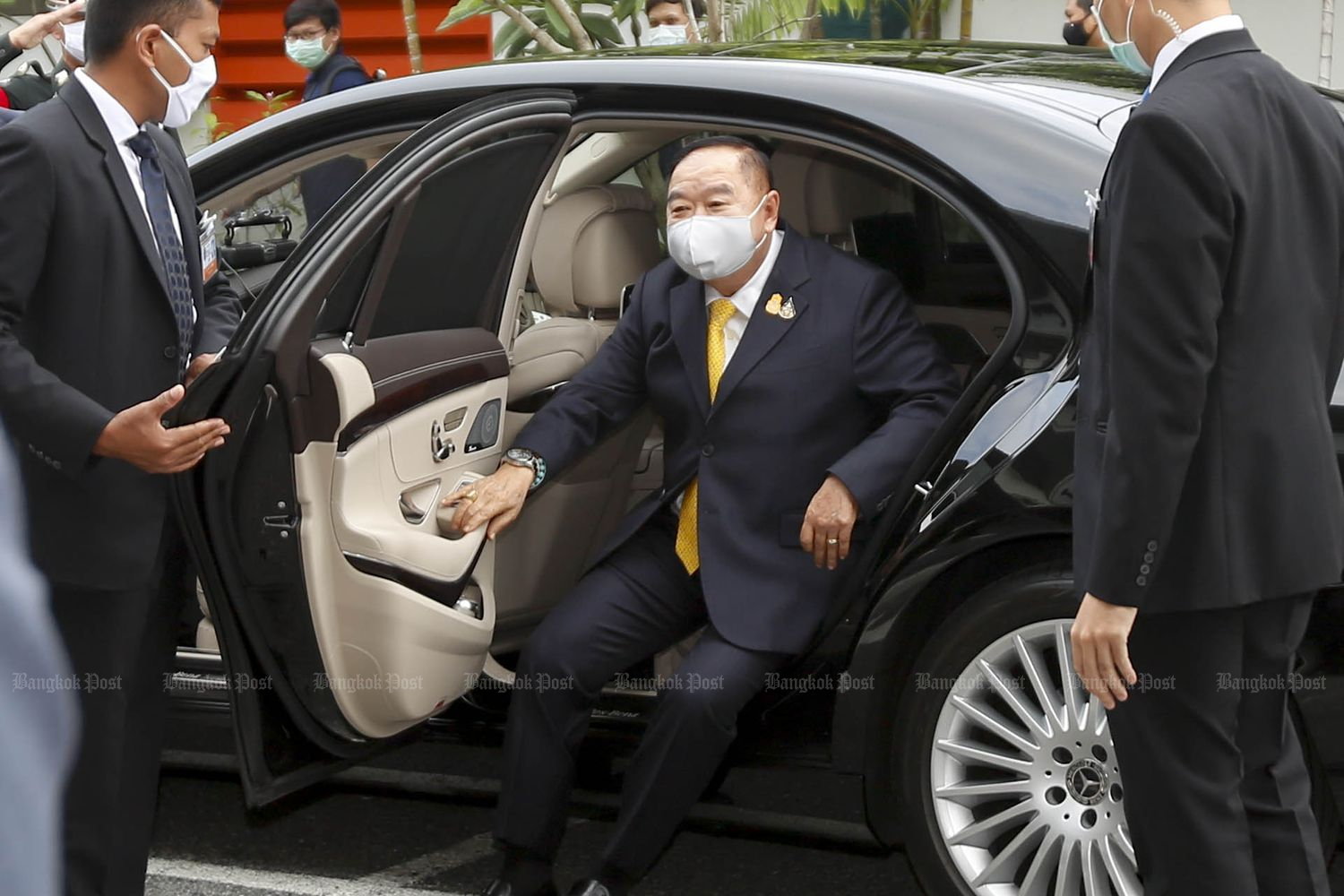 Deputy Prime Minister Prawit Wongsuwon gets out of a car after arriving at a dormitory of state-owned CAT Telecom Plc, where health personnel of the Chulabhorn Royal Academy stay, on April 14. (Photo by Pattarapong Chatpattarasill) Deputy Prime Minister Prawit Wongsuwon gets out of a car after arriving at a dormitory of state-owned CAT Telecom Plc, where health personnel of the Chulabhorn Royal Academy stay, on April 14. (Photo by Pattarapong Chatpattarasill)