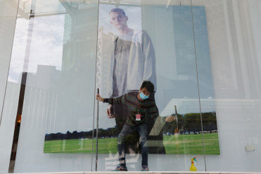 Malaysia cuts key interest rate to 10-year low