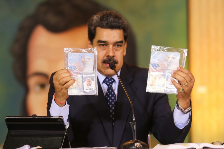 Venezuela President Nicolas Maduro says two Americans will face trial for allegedly being part of a mercenary force that tried to invade the South American country Venezuela President Nicolas Maduro says two Americans will face trial for allegedly being part of a mercenary force that tried to invade the South American country