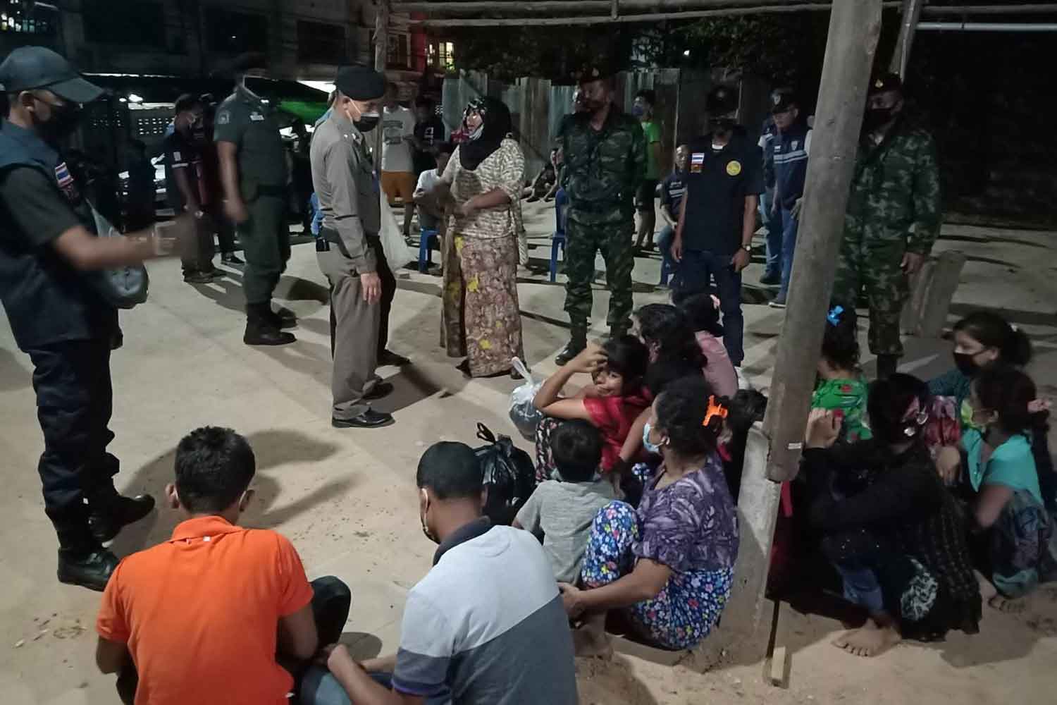 The 12 illegal Rohingya migrants, including two children, at Mae Sot police station in Tak after being arrested for illegal entry on Tuesday night. (Photo: Assawin Pinitwong)