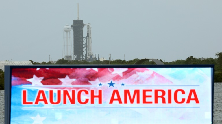 A SpaceX Falcon 9 rocket with the Crew Dragon spacecraft sits atop launch complex 39A at the Kennedy Space Center in Florida on May 25, 2020. A SpaceX Falcon 9 rocket with the Crew Dragon spacecraft sits atop launch complex 39A at the Kennedy Space Center in Florida on May 25, 2020.