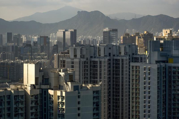 Aerial view of residential buildings in front of Lion Rock in the Yau Tong area, east of the Kowloon Peninsula in Hong Kong. (South China Morning Post photo)