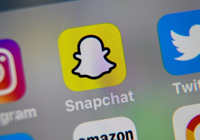 Snapchat curbs Trump posts for inciting 'racial violence'