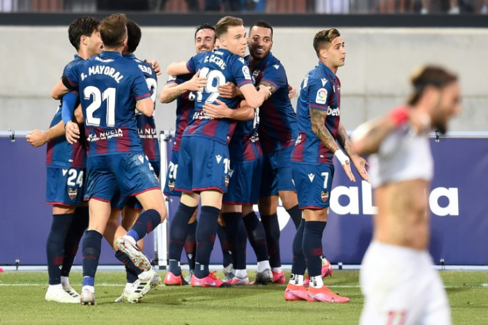 Late own goal sees Sevilla stutter in Champions League chase