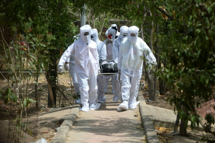 China cancels flights, classes as India deaths soar: Virus update