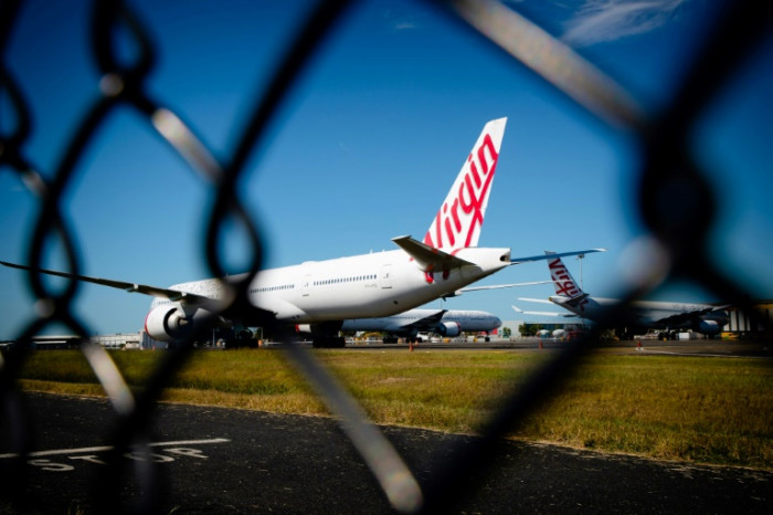 Bain wins bid to buy ailing Australian airline Virgin