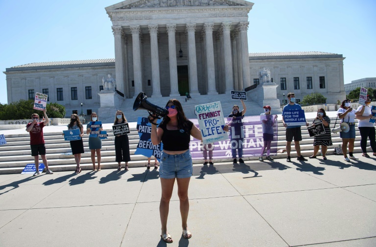 Anti-abortion activists demonstrate in front of the US Supreme Court on June 29, 2020 Anti-abortion activists demonstrate in front of the US Supreme Court on June 29, 2020