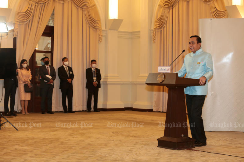 Prime Minister Prayut Chan-o-cha holds a media briefing on Tuesday on the decision to open up the country to ease economic pain. (Photo by Chanat Katanyu) Prime Minister Prayut Chan-o-cha holds a media briefing on Tuesday on the decision to open up the country to ease economic pain. (Photo by Chanat Katanyu)