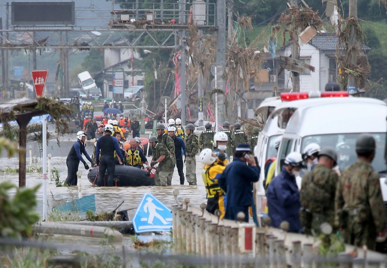 Rescuers are searching for 14 people missing after floods hit the Kumamoto region on Japan's southwestern island of Kyushu. Rescuers are searching for 14 people missing after floods hit the Kumamoto region on Japan's southwestern island of Kyushu.