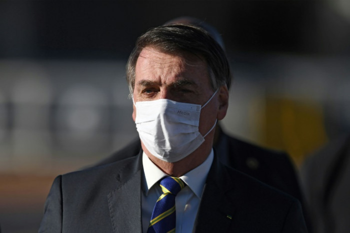 Brazil's Bolsonaro takes virus test after showing symptoms