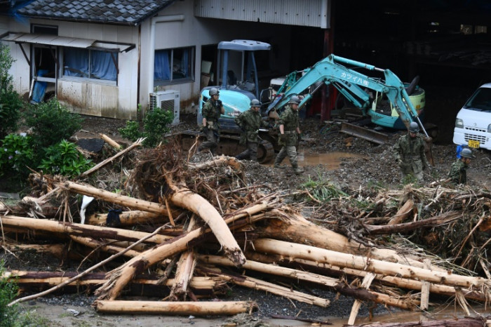 'Race against time' in Japan floods, 50 feared dead