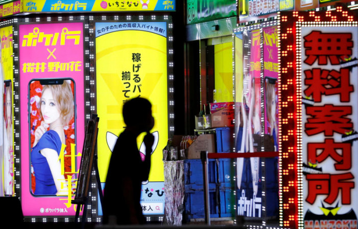 No kissing, disinfect the mic: Japan nightlife sets virus rules