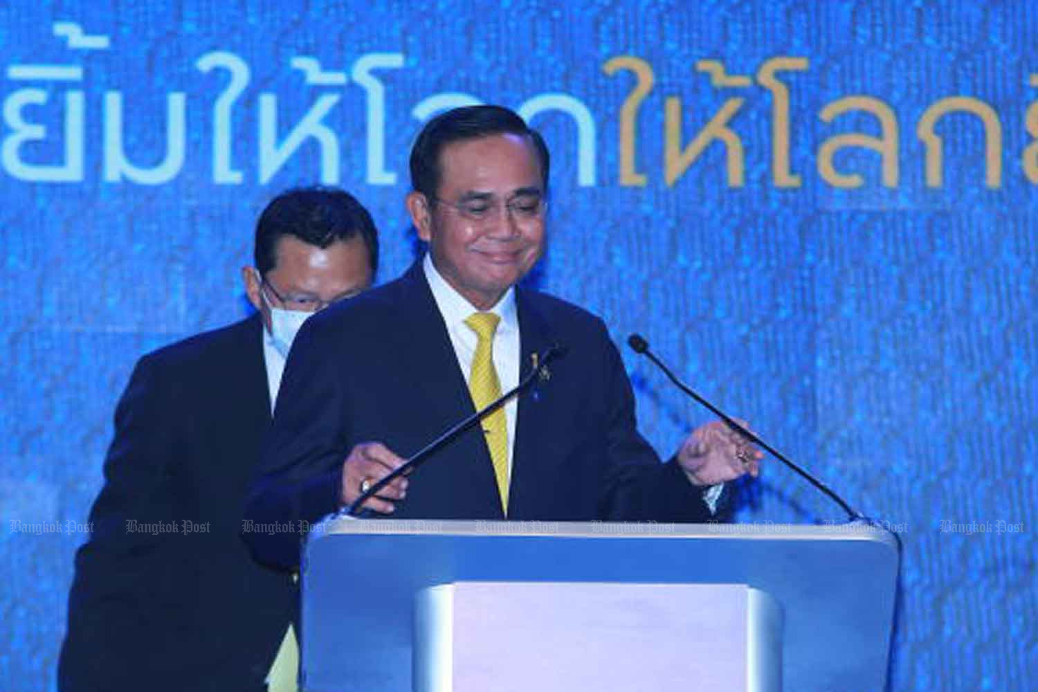 Prime Minister Prayut Chan-o-cha presides over a press briefing on the 'Thailand Smiles With You' campaign aimed at promoting domestic tourism in Bangkok on Thursday. (Photo by Somchai Poomlard)