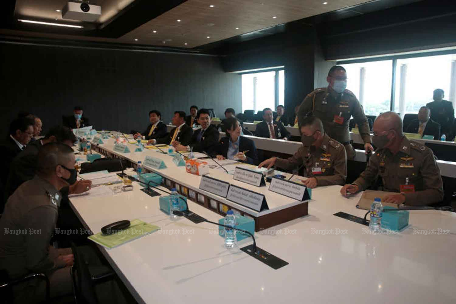 Senior police officers meet the House committee on police affairs at the parliament in Bangkok on Thursday. (Photo by Chanat Katanyu)