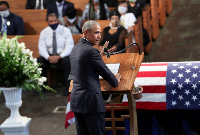 Former US president Barack Obama speaking at the funeral service of John Lewis. Former US president Barack Obama speaking at the funeral service of John Lewis.