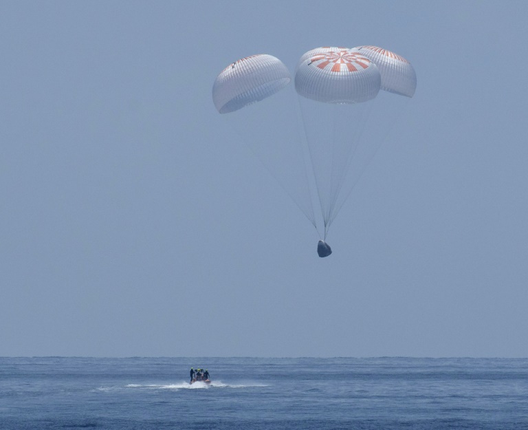 The SpaceX Crew Dragon Endeavour floats down to the Gulf of Mexico on Aug 2, 2020. The SpaceX Crew Dragon Endeavour floats down to the Gulf of Mexico on Aug 2, 2020.