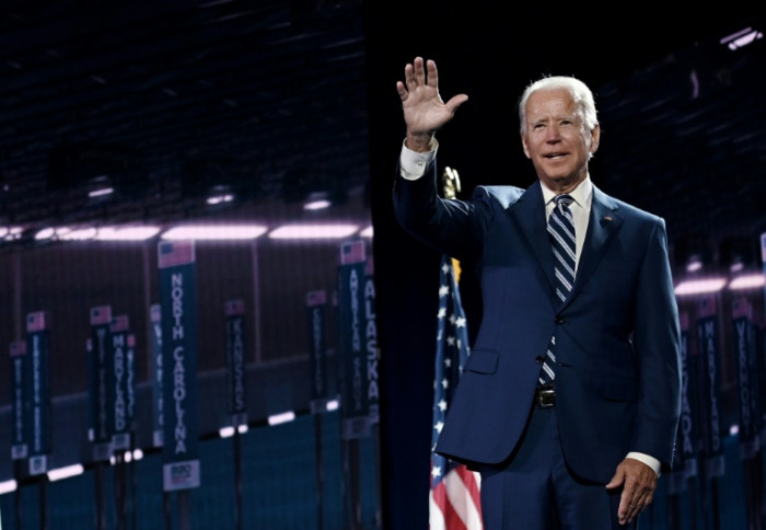 Biden pledges 'a new path' as he prepares to accept White House nom