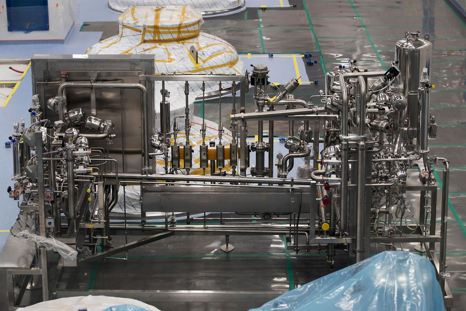 Equipment stands in a bioreactor hall under construction for Samsung BioLogics Plant 3 in Incheon, South Korea in 2017. Samsung is building a $740 million factory that will give it the capacity to become the No.1 producer by volume of a class of drugs called biologics, many of which are derived from mammal cells. Equipment stands in a bioreactor hall under construction for Samsung BioLogics Plant 3 in Incheon, South Korea in 2017. Samsung is building a $740 million factory that will give it the capacity to become the No.1 producer by volume of a class of drugs called biologics, many of which are derived from mammal cells.