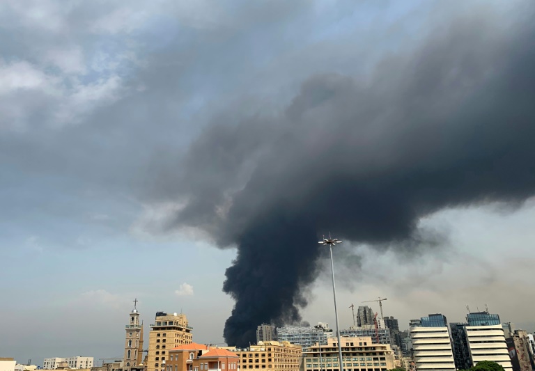 A huge column of black smoke billows into the sky over Beirut as the city's port is again engulfed by fire just weeks after a devastating dockside explosion A huge column of black smoke billows into the sky over Beirut as the city's port is again engulfed by fire just weeks after a devastating dockside explosion