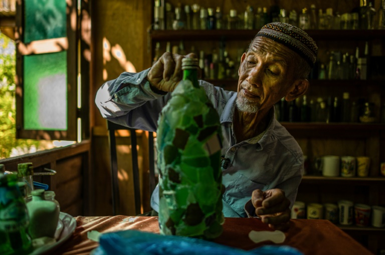 For the past 15 years, Tengku Mohamad Ali Mansor has made it his mission to collect bottles washed ashore on Malaysia's rugged South China Sea coast For the past 15 years, Tengku Mohamad Ali Mansor has made it his mission to collect bottles washed ashore on Malaysia's rugged South China Sea coast