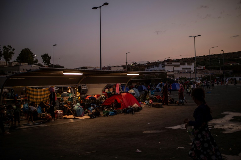 Thousands have been sleeping under tarpaulins or tents at roadsides and in the car parks of closed supermarkets since the fire Thousands have been sleeping under tarpaulins or tents at roadsides and in the car parks of closed supermarkets since the fire