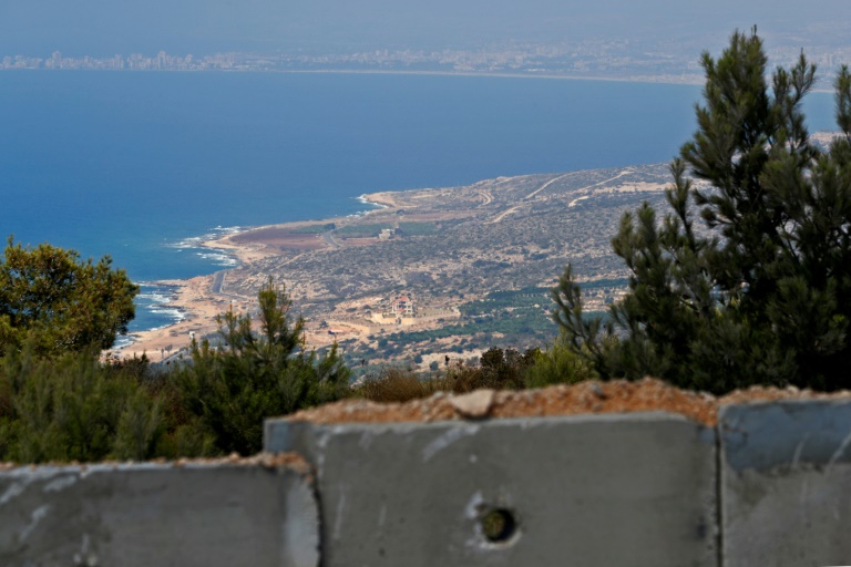 The picture taken on September 5, 2018 near Israel's Rosh Hanikra border crossing with Lebanon shows the Naqoura border town in southern Lebanon where Lebanese and Israeli delegates are to hold UN-mediated talks on their disputed border. The picture taken on September 5, 2018 near Israel's Rosh Hanikra border crossing with Lebanon shows the Naqoura border town in southern Lebanon where Lebanese and Israeli delegates are to hold UN-mediated talks on their disputed border.