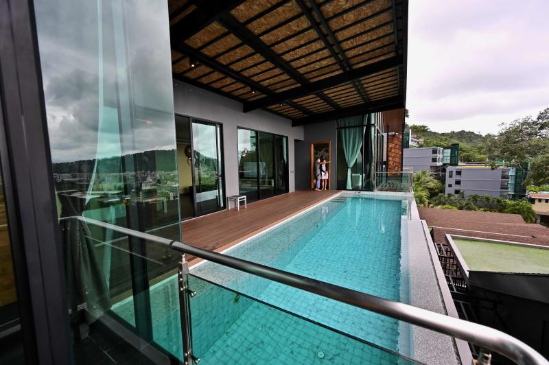 A villa converted for use as an alternative state quarantine (ASQ) room for incoming overseas tourists is seen at The Senses Resort in Phuket on Saturday. (AFP photo)