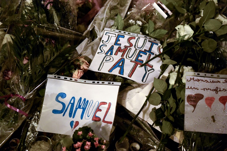 Thousands marched Tuesday in the suburb of Conflans-Sainte-Honorine where murdered teacher Samuel Paty worked. Thousands marched Tuesday in the suburb of Conflans-Sainte-Honorine where murdered teacher Samuel Paty worked.
