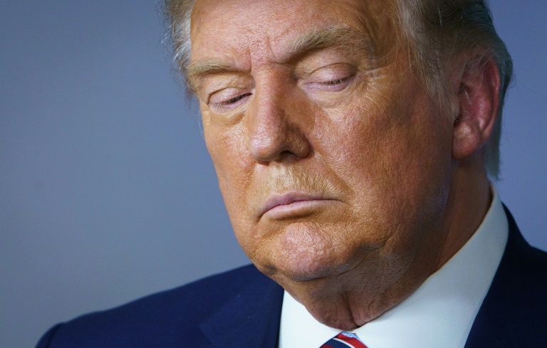 US President Donald Trump looks down during an event on lowering prescription drug prices on November 20, 2020 US President Donald Trump looks down during an event on lowering prescription drug prices on November 20, 2020