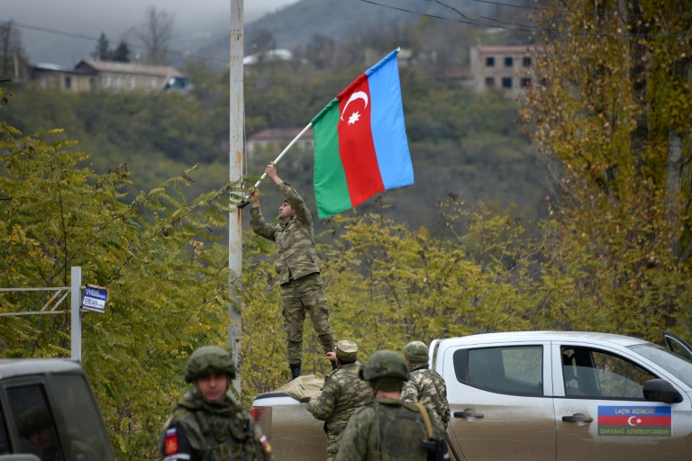 Azerbaijani forces raise flag in last district handed back by Armenia