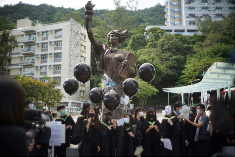 The arrests under the national security law in Hong Kong were linked to an unofficial graduation rally at a university campus. The arrests under the national security law in Hong Kong were linked to an unofficial graduation rally at a university campus.