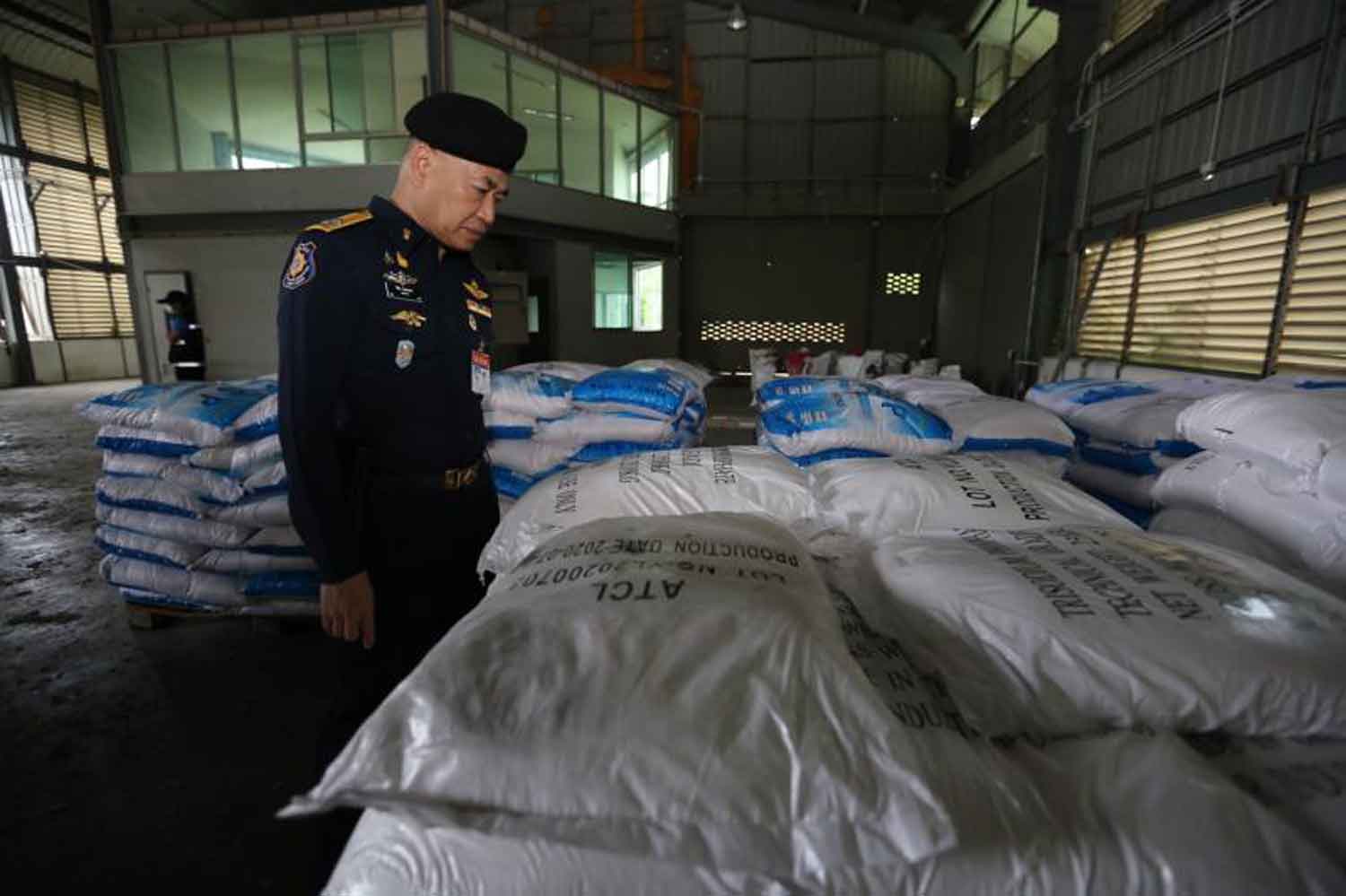 Wichai Chaimongkol, secretary-general of the Office of the Narcotics Control Board, inspects what turned out to be trisodium phosphate, in Chachoengsao province last month. (Police photo) Wichai Chaimongkol, secretary-general of the Office of the Narcotics Control Board, inspects what turned out to be trisodium phosphate, in Chachoengsao province last month. (Police photo)