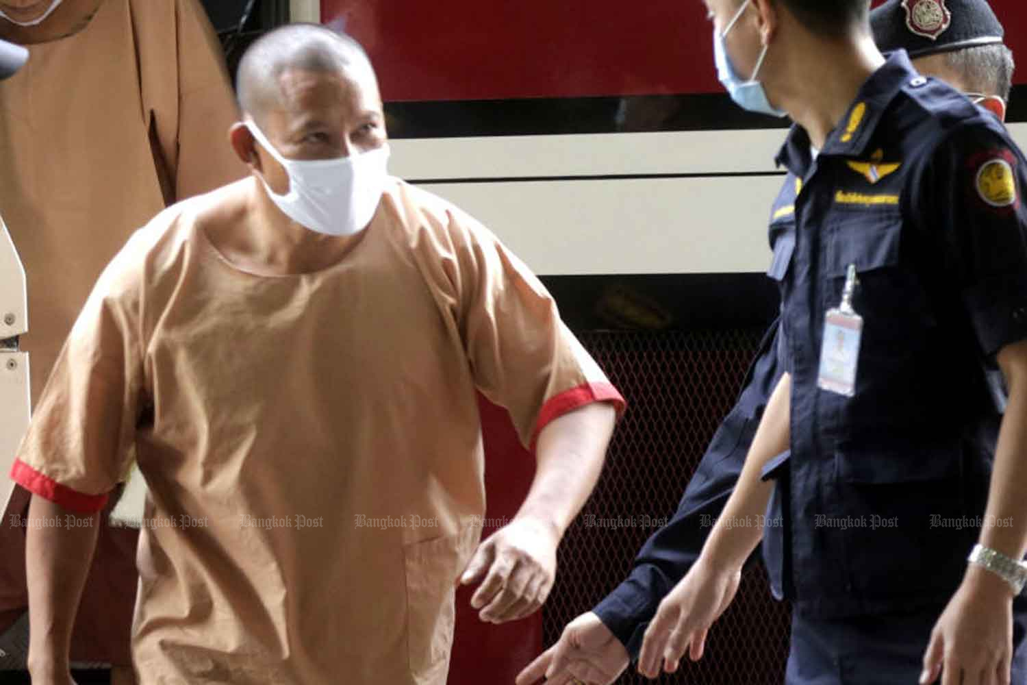 Lao drug kingpin Xaysana Keopimpha arrives at the Criminal Court in Bangkok on Tuesday. (Photo: Pornprom Satrabhaya) Lao drug kingpin Xaysana Keopimpha arrives at the Criminal Court in Bangkok on Tuesday. (Photo: Pornprom Satrabhaya)