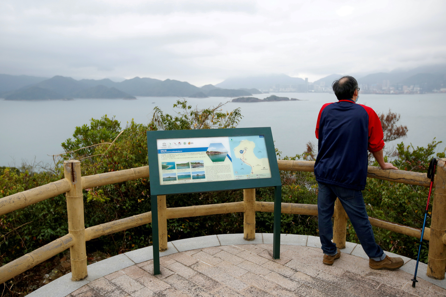 The father of one of 12 detainees held in China stands on a peak in Hong Kong overlooking Yantian district in the neighbouring Chinese mainland city of Shenzhen. (Reuters Photo) The father of one of 12 detainees held in China stands on a peak in Hong Kong overlooking Yantian district in the neighbouring Chinese mainland city of Shenzhen. (Reuters Photo)