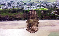 Drone view of homes after Welsh cliff collapse