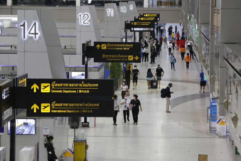 Passengers are seen at Don Mueang airport on May 2, 2020, after domestic flights resume at Don Mueang airport. (Photo by Pornprom Satrabhaya)