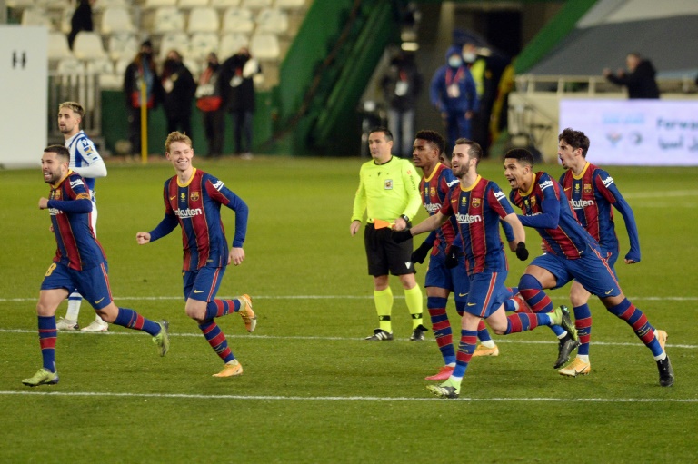 Barcelona celebrate their penalty shootout win over Real Sociedad in the semi-finals of the Spanish Super Cup. Barcelona celebrate their penalty shootout win over Real Sociedad in the semi-finals of the Spanish Super Cup.
