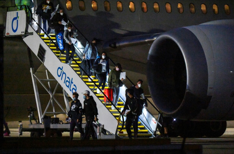 Two people on a charter flight bringing players and their entourages to Melbourne for the Australian Open have reportedly tested positive for the coronavirus. Two people on a charter flight bringing players and their entourages to Melbourne for the Australian Open have reportedly tested positive for the coronavirus.