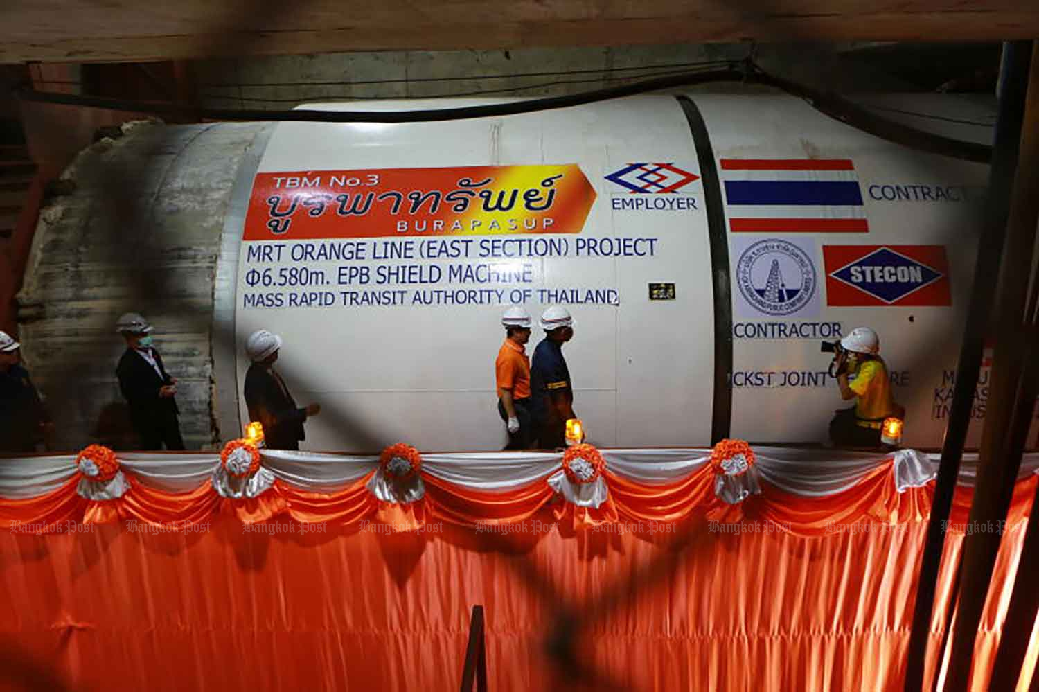 The Mass Rapid Transit Authority activates a tunnel-boring machine for the eastern section of the Orange Line under Ramkhamhaeng Road in Bang Kapi district, Bangkok, in March last year. (Photo: Somchai Poomlard) The Mass Rapid Transit Authority activates a tunnel-boring machine for the eastern section of the Orange Line under Ramkhamhaeng Road in Bang Kapi district, Bangkok, in March last year. (Photo: Somchai Poomlard)